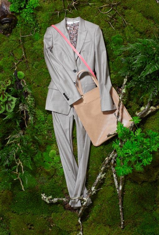 HUGO BOSS solid wool suit in mélange gray jacket, $550 & pant $275. CACHAREL short-sleeve printed blouse in rouge, $470. SCHUMACHER pretty shopper in rosy tan, $550.